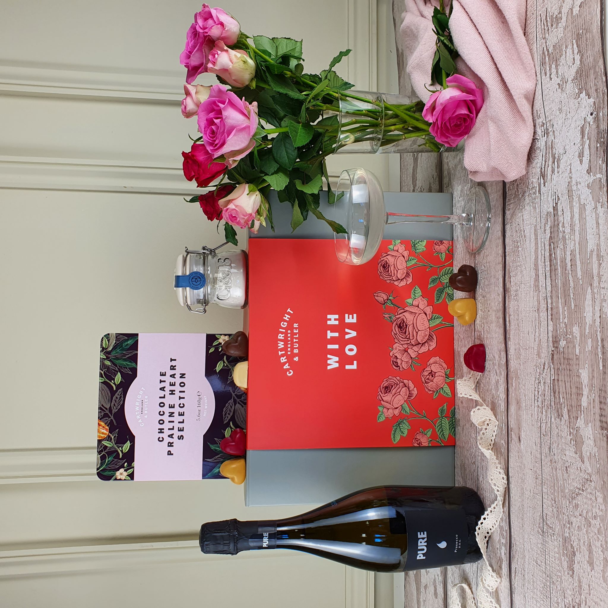 A Valentine's Day hamper for her featuring prosecco, flowers and chocolates