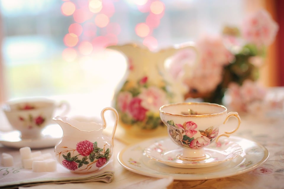 Afternoon tea floral crockery on table