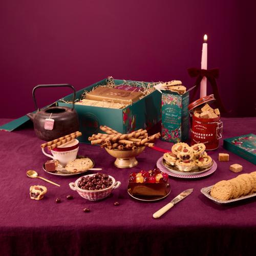 The Festive Celebration Gift Box with all the products that it contains including fudge, mince pies and biscuits 
